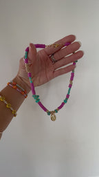 Gold cowrie necklace