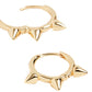 Gold revolver huggie earrings
