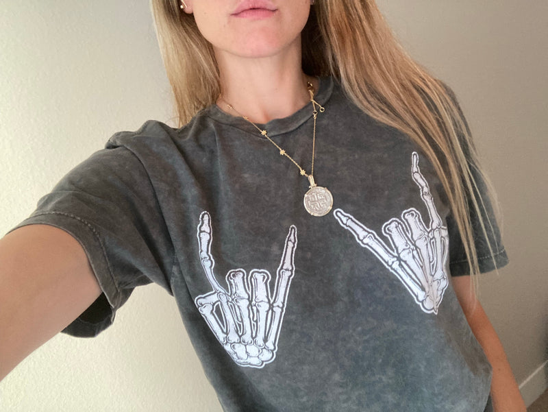 Skeleton rock on boyfriend tee in washed gray